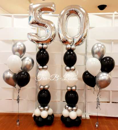 50 birthday linking balloon columns black white silver bouquets